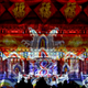 Visitors watch the Forbidden City is illuminated with colorful lights during the Lantern Festival in Beijing, Tuesday, Feb. 19, 2019. Beijing's Palace Museum was illuminated and opened for night visits to celebrate China's Lantern Festival. For the first time since it was established 94 years ago, the Palace Museum, also known as the Forbidden City, extended opening hours till nighttime and lit up part of its cultural relics buildings. (AP Photo/Andy Wong)